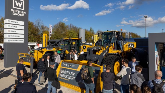 John Deere wheel loader models 744 P-Tier and 824 P-Tier at the Wirtgen Group exhibition booth during Bauma.