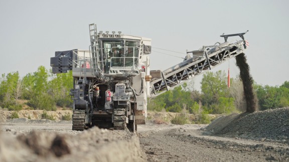 The Surface Miner cuts the limestone and deposits it alongside the machine.