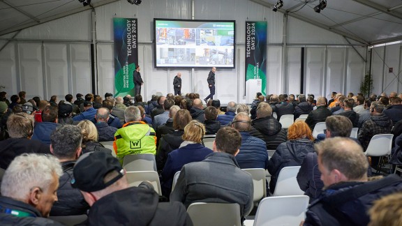 Expert speaking before an audience of professional visitors to the event