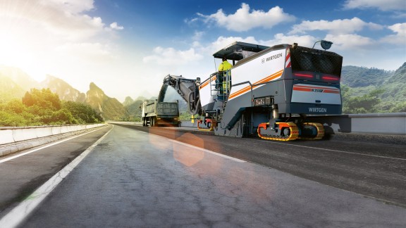 A W 215 P on a construction site, composite image