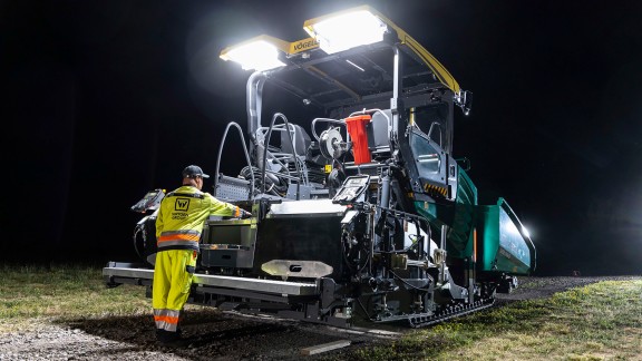 Night-time photo of an operator using the Paver Access Control system