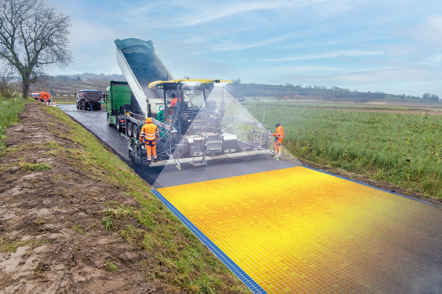 The image shows the temperature-measurement system RoadScan from VÖGELE in action