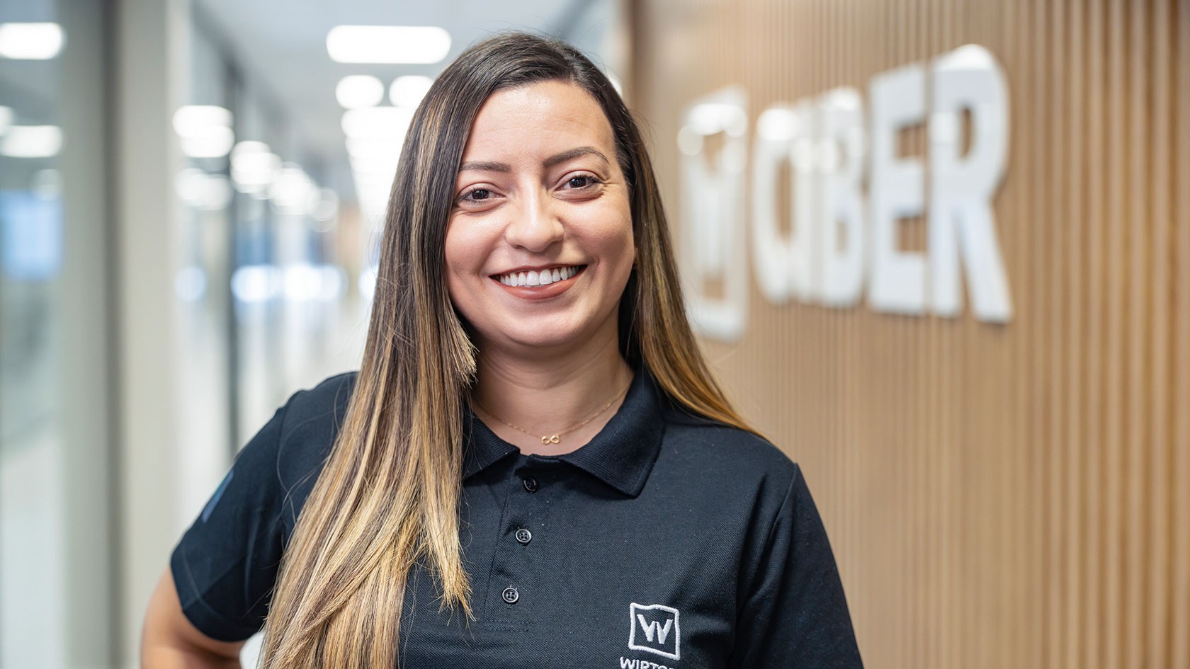 Smiling young administrative staff member from Ciber