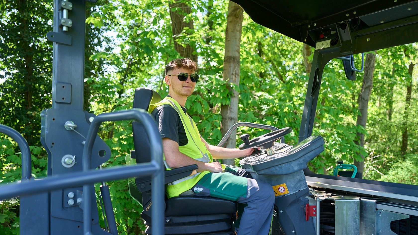 A trainee at the wheel of a Vögele paver