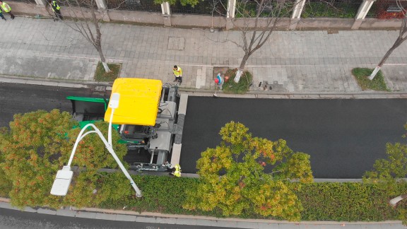The SUPER 1680-3 LI during pavement rehabilitation on the Fuyun Road