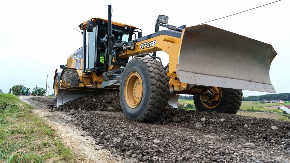 The John Deere 672 GP Grader in action