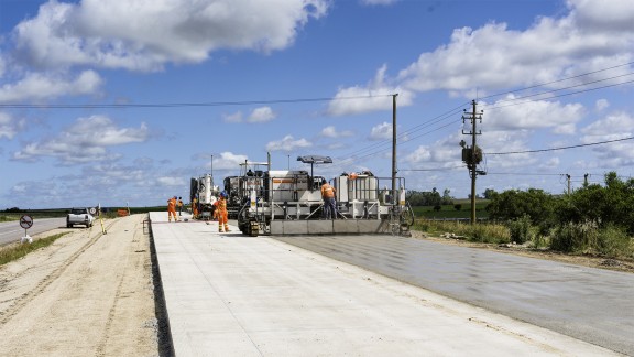 Paving the roadway with the SP 64