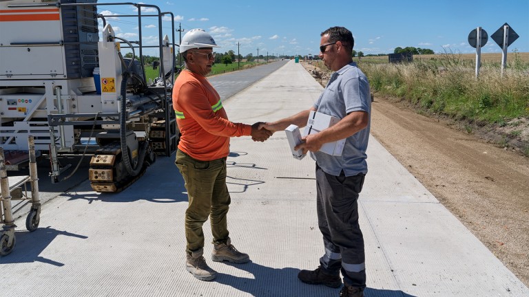 Two men, shaking hands