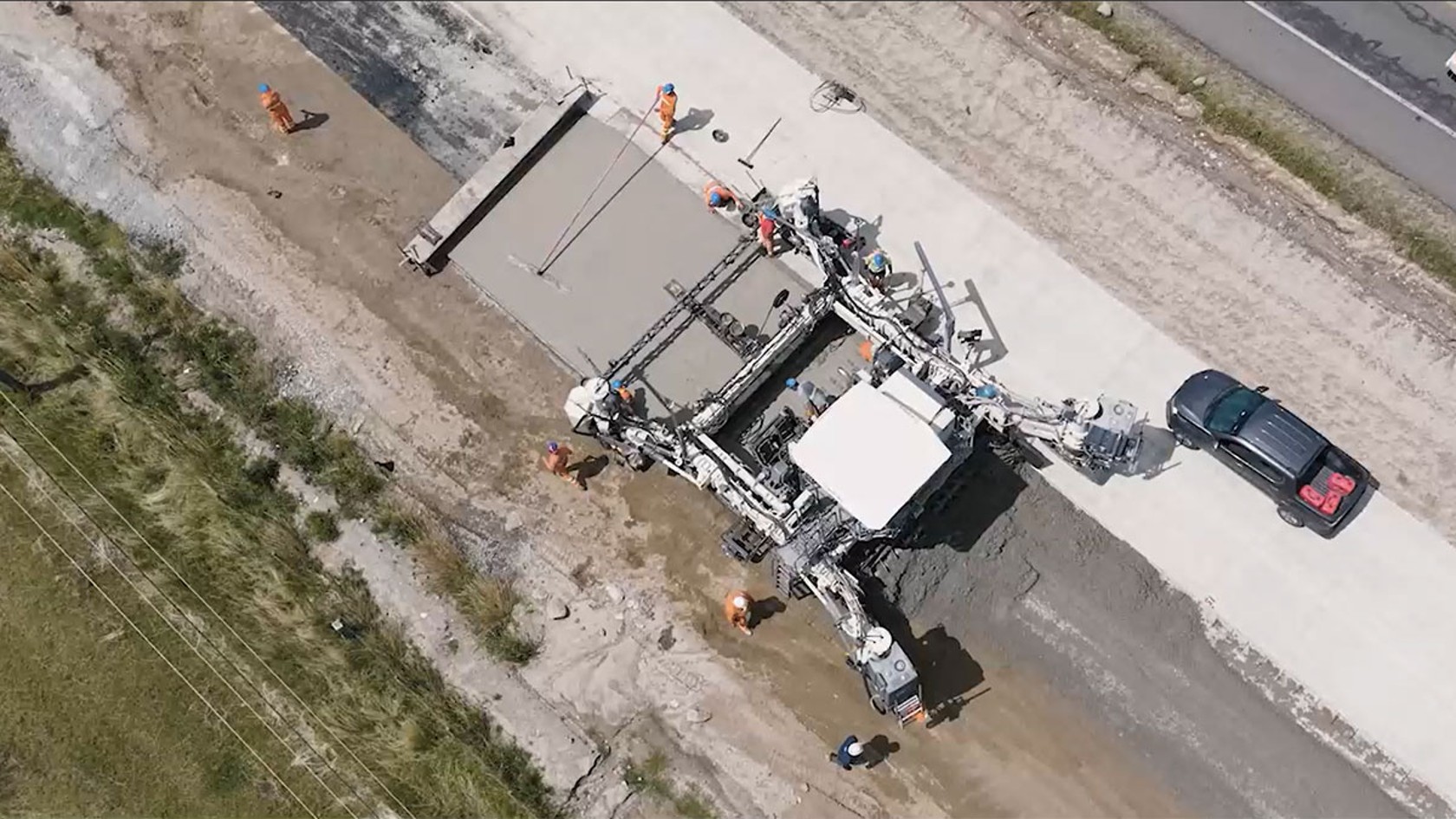 Paving the concrete roadway with the SP 64