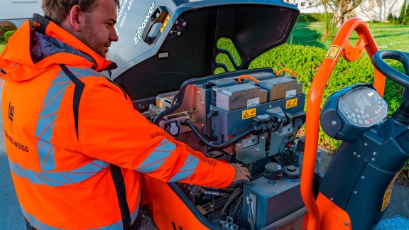 View of the lithium-ion battery in the motor compartment of the roller.