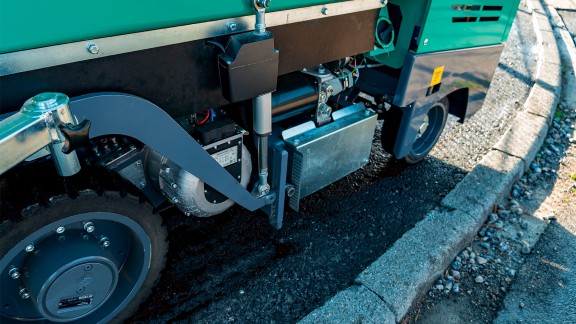 View of the wheeled paver and the tight curve radius.