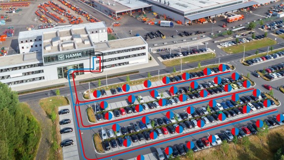 Aerial view with geothermal energy system diagram overlaid