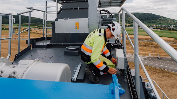 Apprentice engaged in installation work on the CORE.