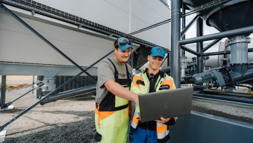 Trainee working on an electrical enclosure at the top level of the CORE.