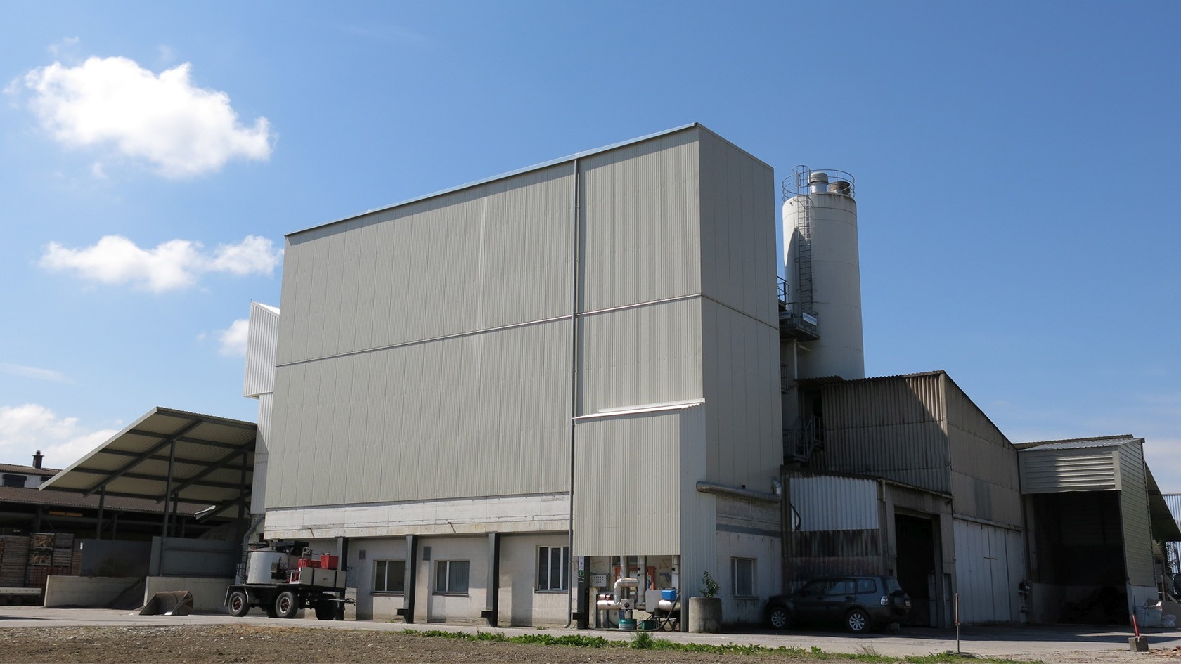 View of the asphalt mixing plant in Busswil, blue sky