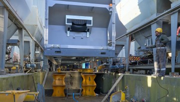 El tambor de secado se introduce en la planta de mezcla encapsulada gracias a una construcción especial.