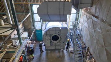 El tambor de secado se introduce en la planta de mezcla encapsulada gracias a una construcción especial.